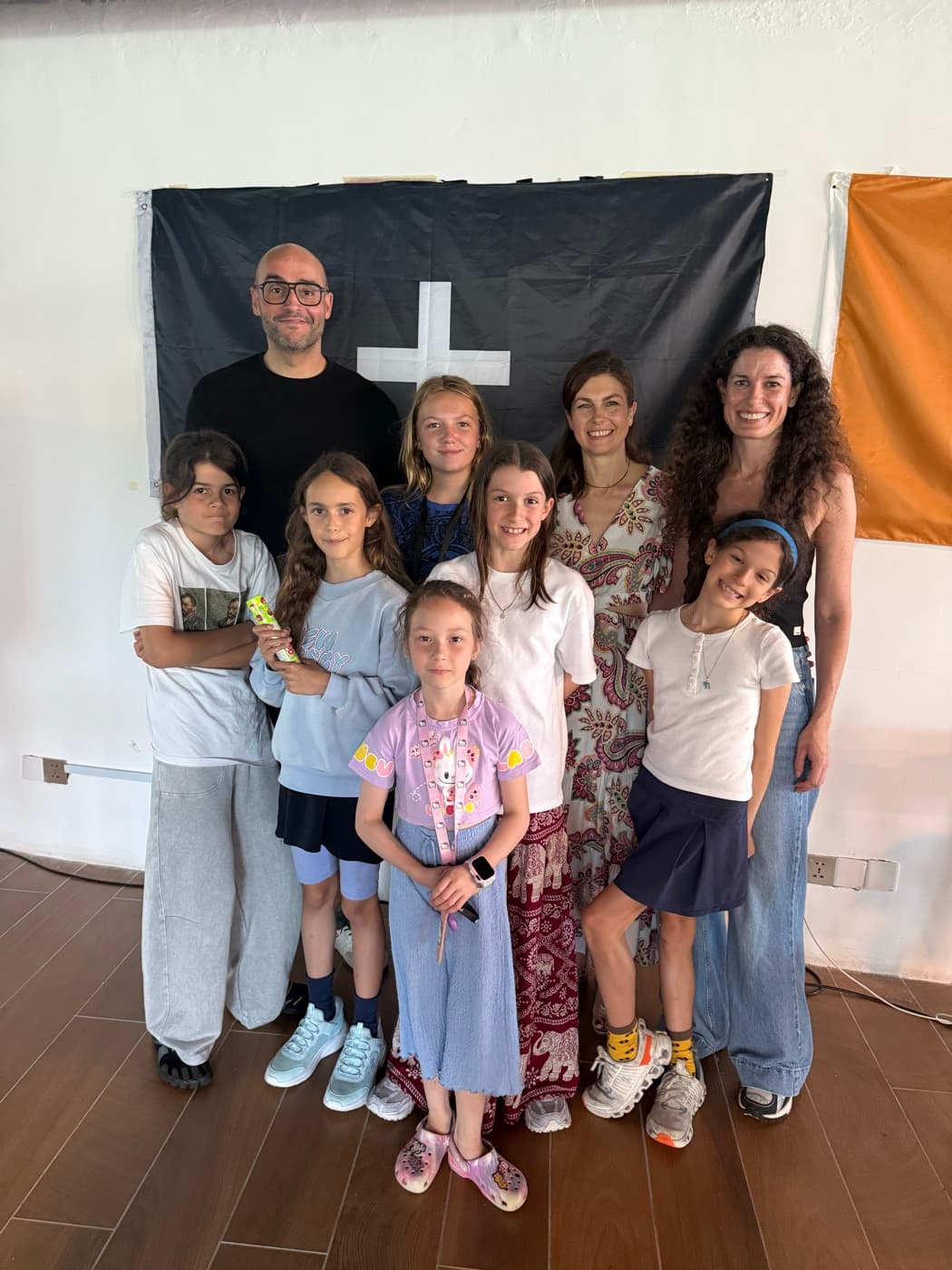 Facilitators and children together after a program day